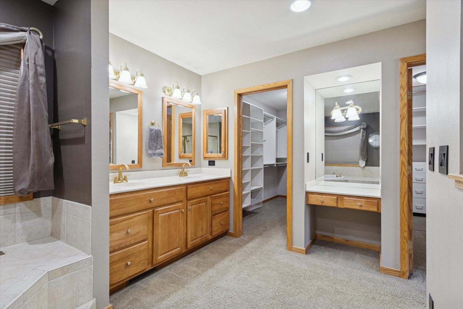 97 Highcrest Court Shannon, IL 61078 - Photo 41 of 58 a bathroom with a tub sink shower and mirror