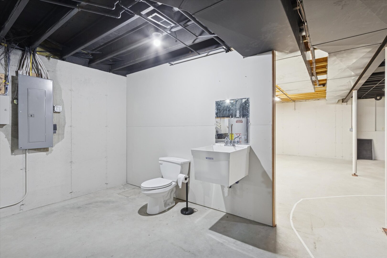 97 Highcrest Court Shannon, IL 61078 - Photo 49 of 58 a bathroom with a sink toilet and shower