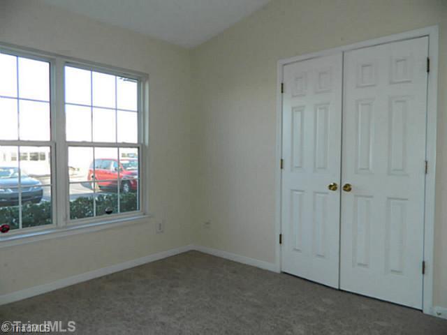 2924 WaterStone Loop High Point, NC 27265 - Photo 12 of 16 2nd Bedroom. Double closets in bedroom