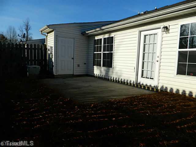 2924 WaterStone Loop High Point, NC 27265 - Photo 16 of 16 Patio/Deck. Back of townhouse has private storage room