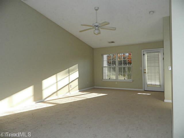 2924 WaterStone Loop High Point, NC 27265 - Photo 4 of 16 Living Room. Spacious living room with vaulted ceilings
