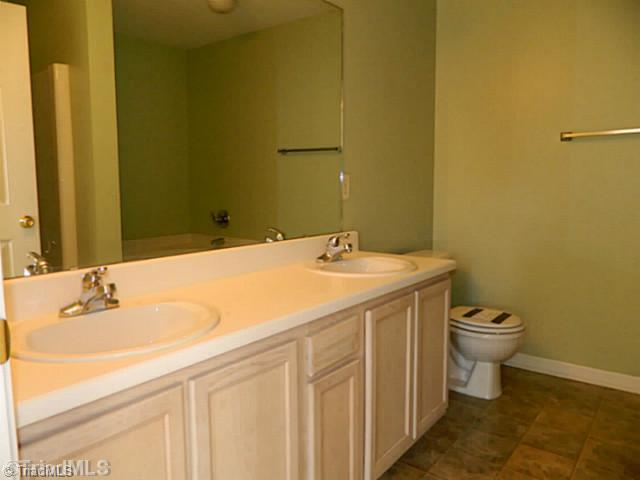 2924 WaterStone Loop High Point, NC 27265 - Photo 10 of 16 Master Bath/Spa. Double vanities with separate shower and garden tub