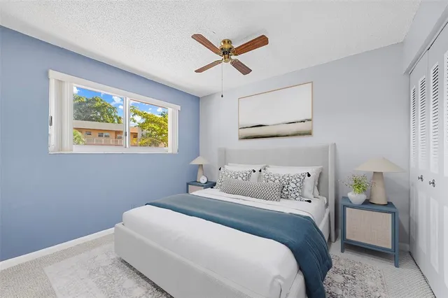 a view of an entryway with wooden floor and a livingroom view