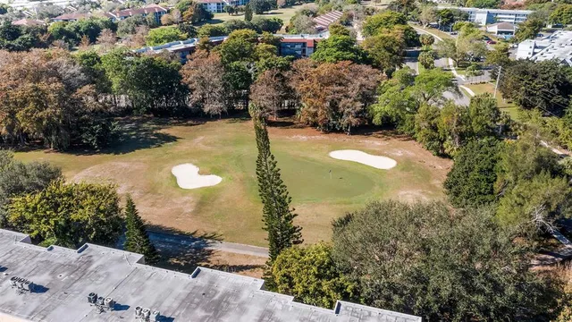 a view of a lake with a yard