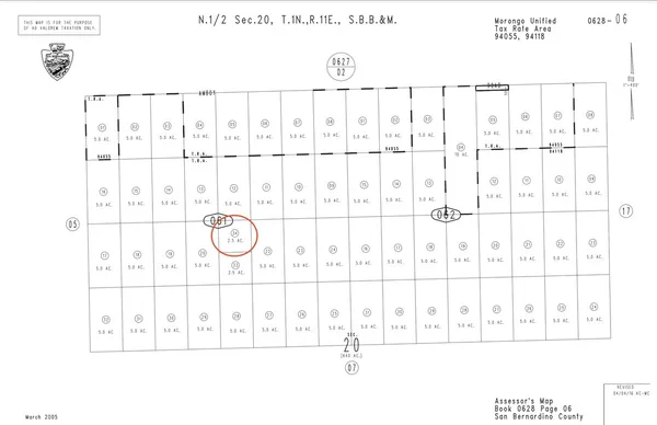 a black and white photo of a black gate