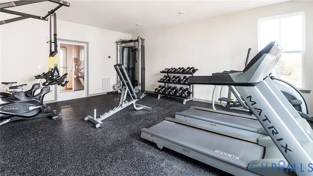 a view of a room with gym equipment