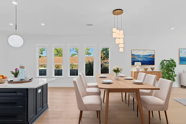 a bathroom with a double vanity sink mirror double and shower