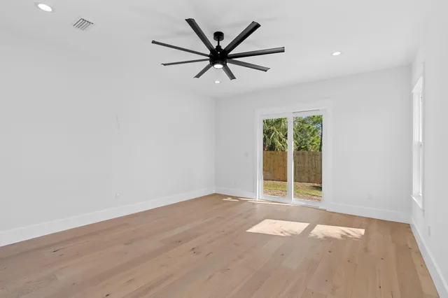 a bathroom with a double vanity sink and mirror