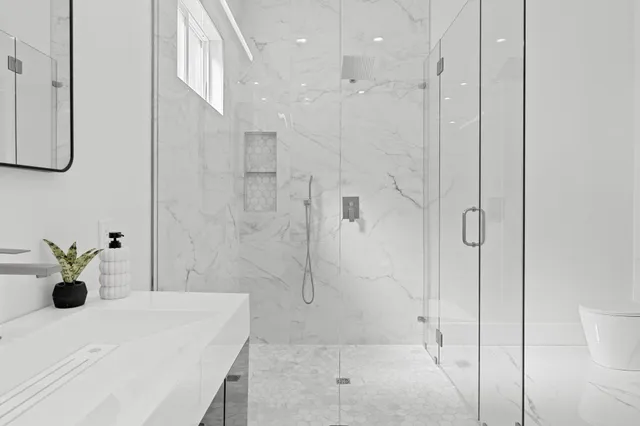 a bathroom with sink and a mirror