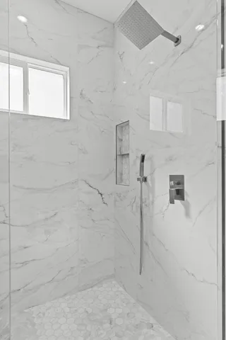 a view of room with window and bathroom