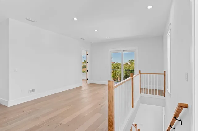 a utility room with sink dryer and washer