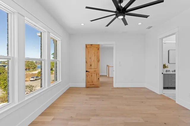 an aerial view of residential building and ocean
