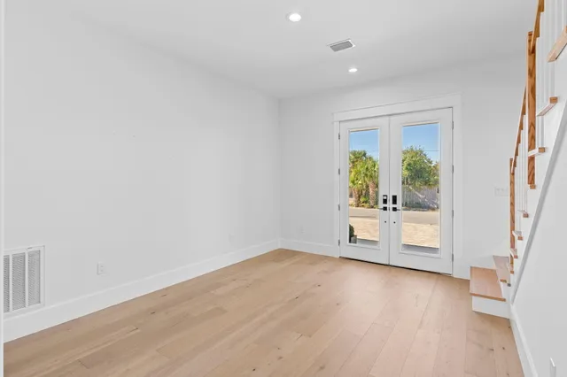 a stove top oven sitting inside of a kitchen