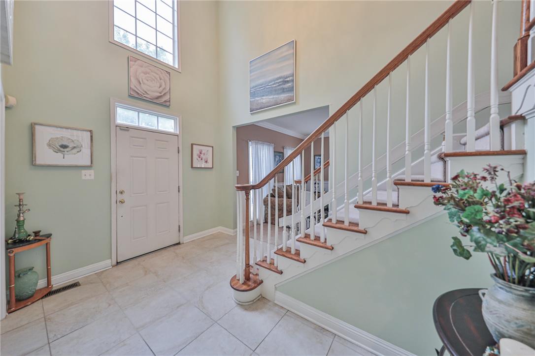 138 Clover Hollow Road Easton, PA 18045 - Photo 8 of 95 A grand entrance with soaring ceilings and a sweeping staircase welcomes all who enter.