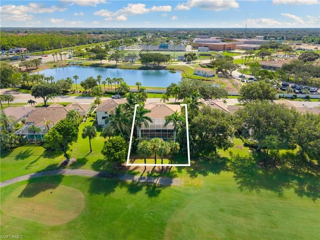 a view of a lake with a city