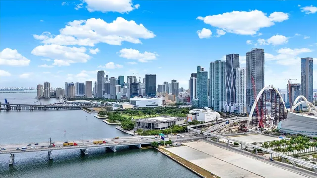 a view of a city with tall buildings