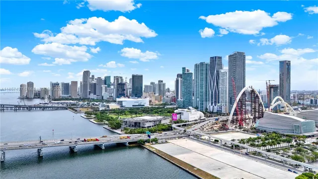 a view of a city with tall buildings