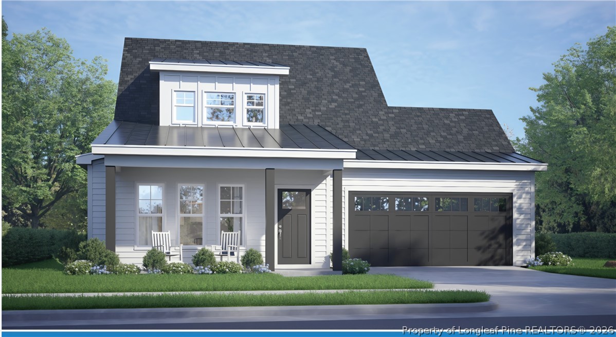 99 Evelene Way Clinton, NC 28328 - Photo 1 of 4 a front view of a house with garden