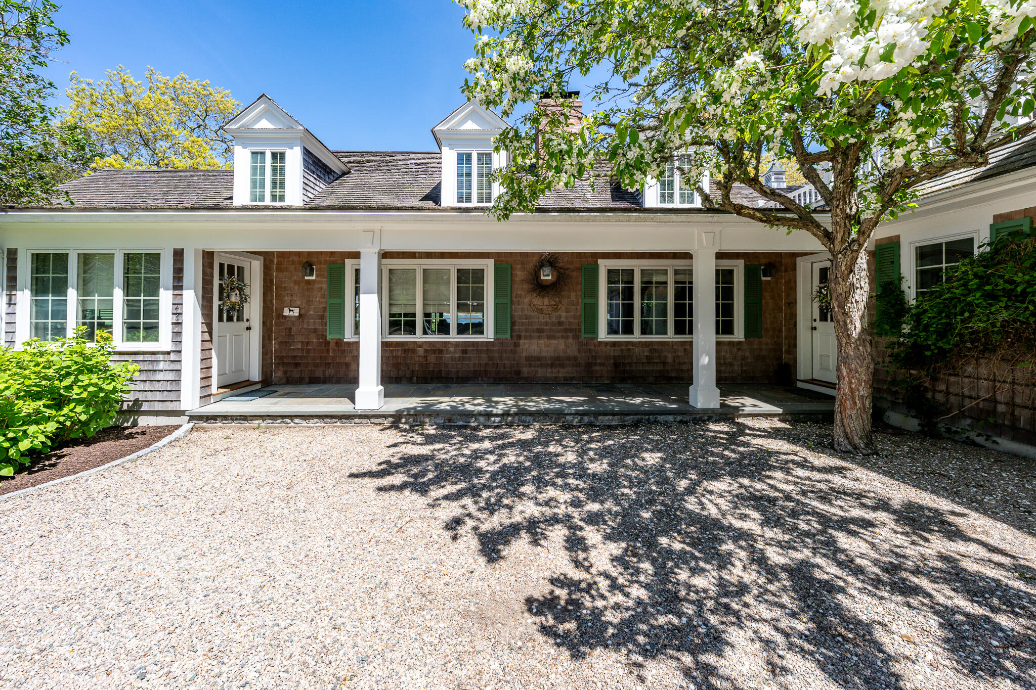 46 Great Bay Road Osterville, MA 02655 - Photo 50 of 54 front view of a house with a yard