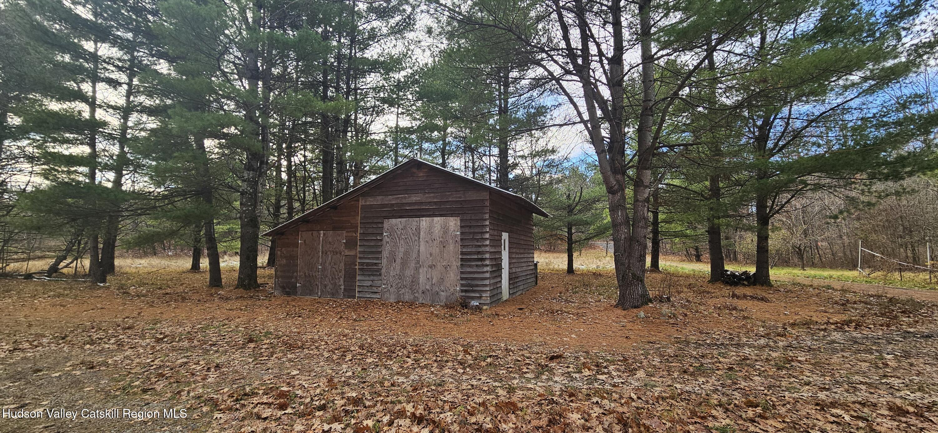 374 North Ridge Road Hannacroix, NY 12087 - Photo 21 of 24 a front view of a house with a yard