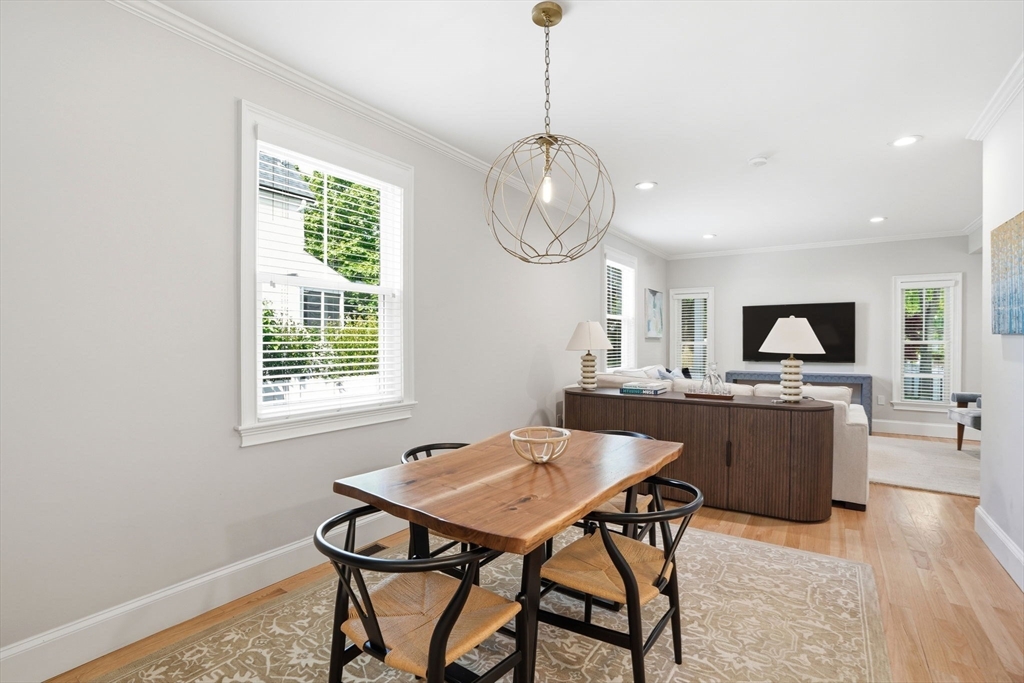 59 Elm Street Hingham, MA 02043 - Photo 12 of 33 a view of a dining room with furniture window and wooden floor