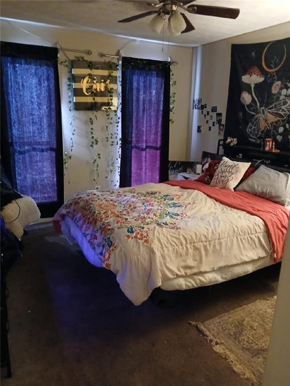 2340 Beaver Ruin Road, Unit UN41 Norcross, GA 30071 - Photo 12 of 12 a bedroom with a bed and a closet
