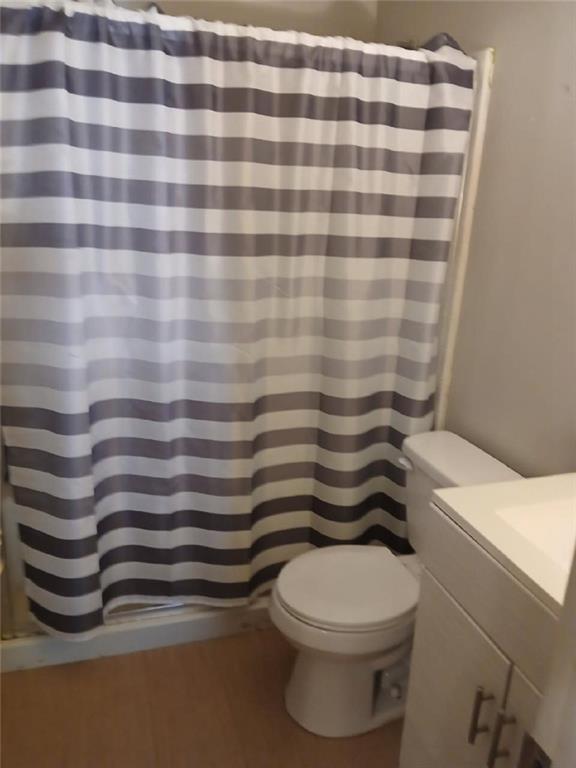 2340 Beaver Ruin Road, Unit UN41 Norcross, GA 30071 - Photo 10 of 12 a bathroom with a sink and a toilet