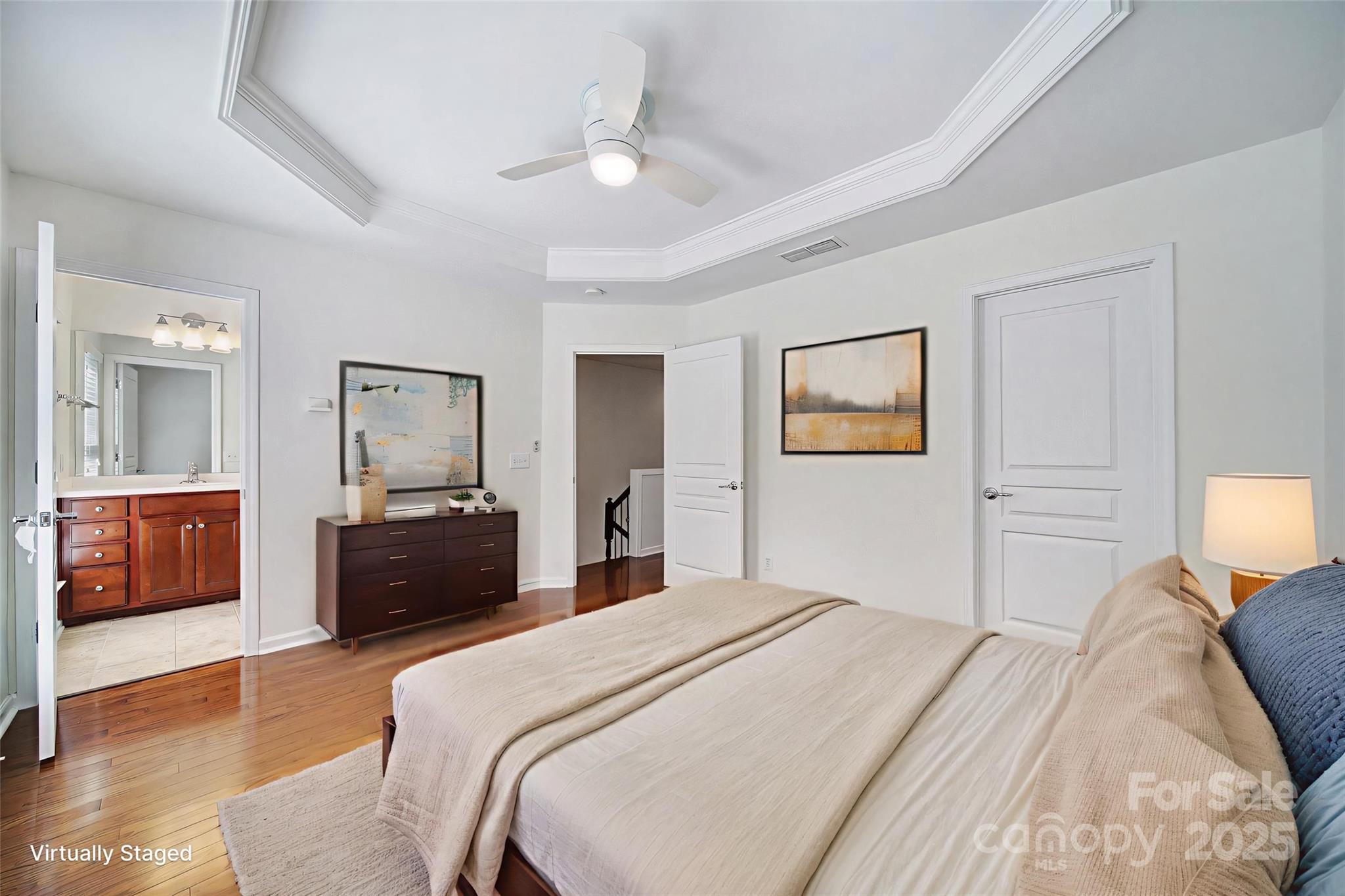 625 6th Baxter Crossing Fort Mill, SC 29708 - Photo 25 of 48 a bedroom with a bed and a couch