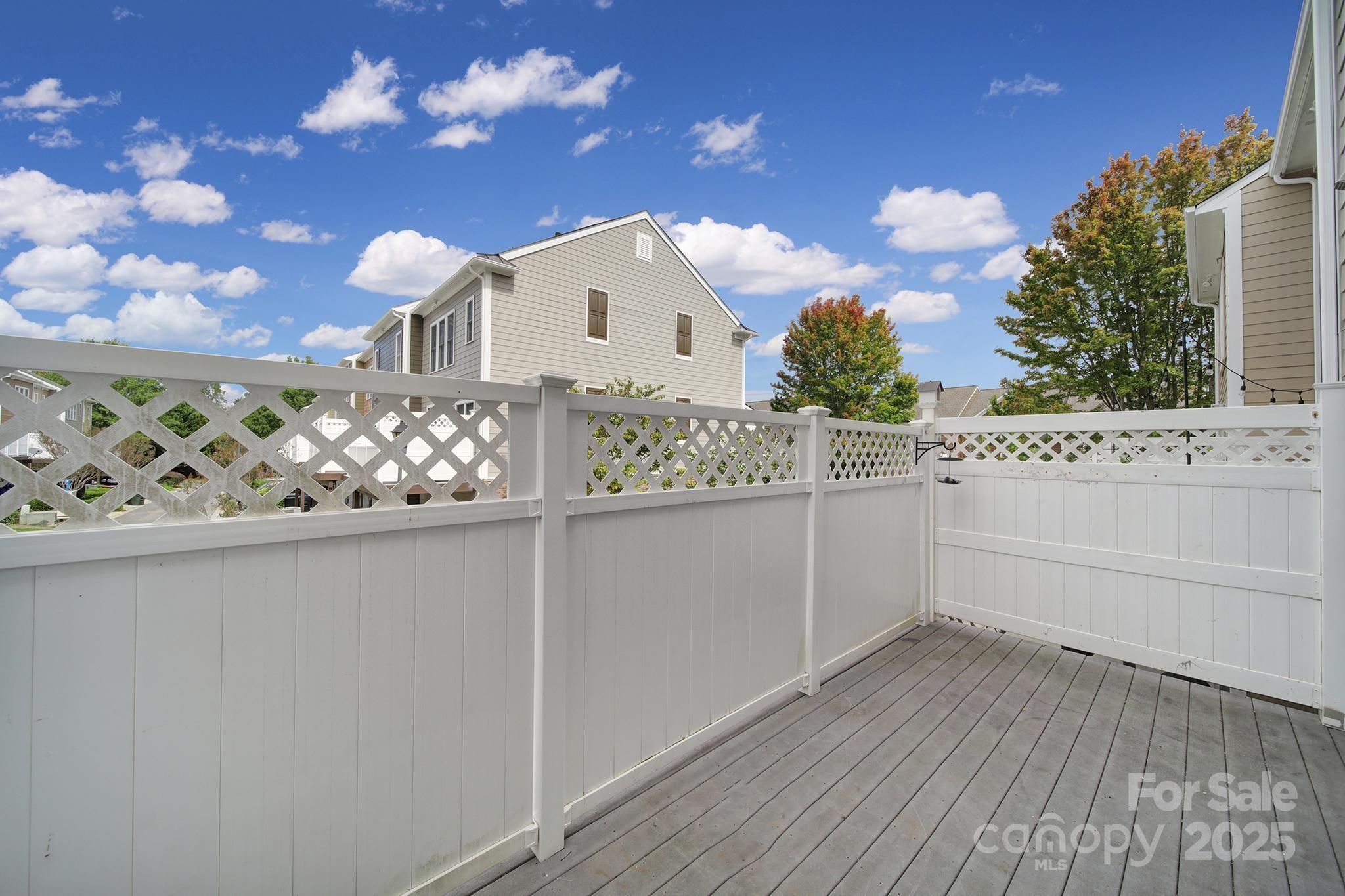 625 6th Baxter Crossing Fort Mill, SC 29708 - Photo 32 of 48 a view of a bathroom with a sink and mirror