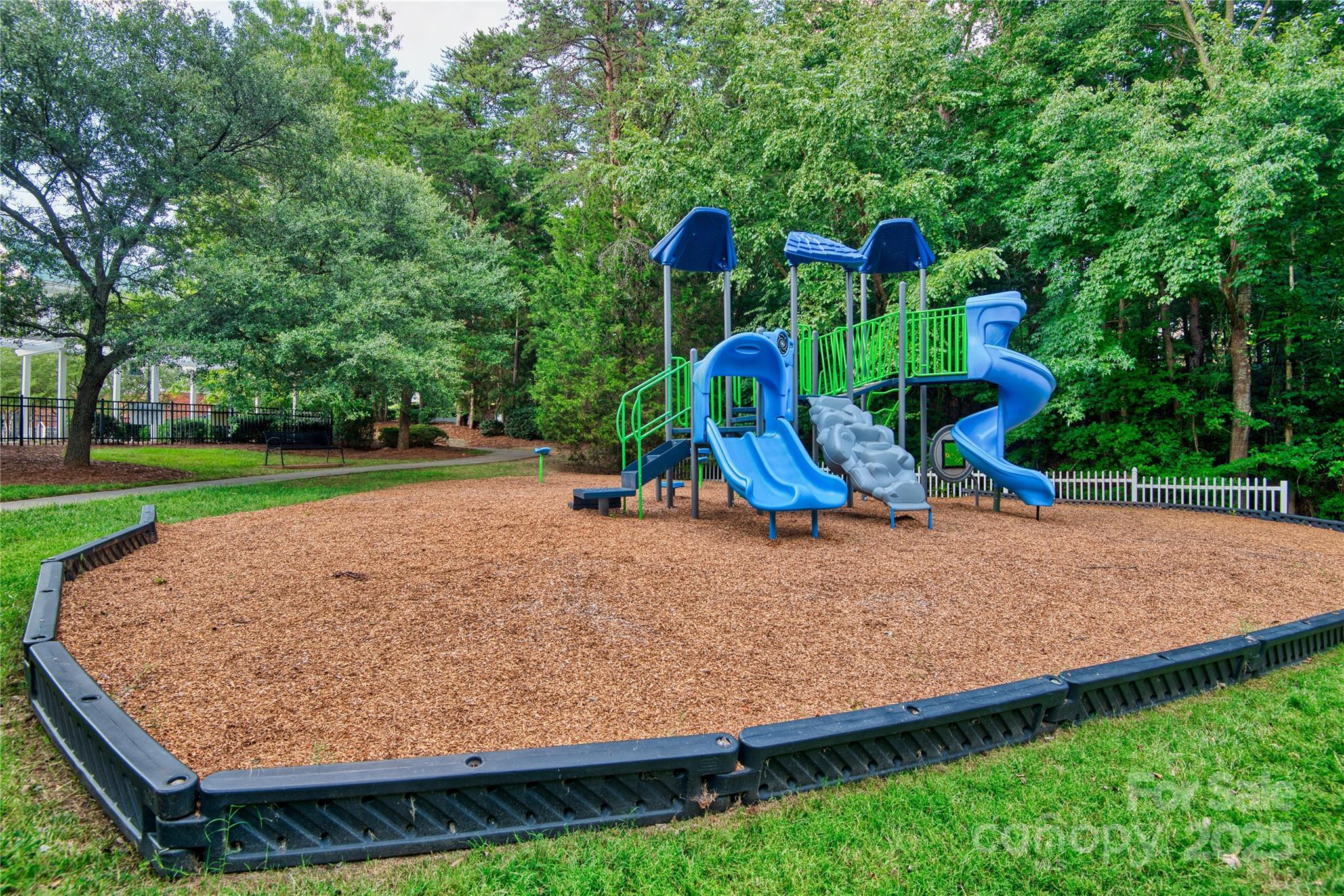 625 6th Baxter Crossing Fort Mill, SC 29708 - Photo 43 of 48 a view of outdoor space with garden and trees