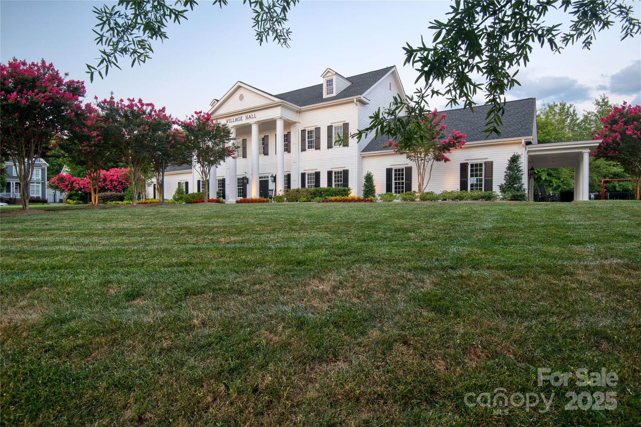 625 6th Baxter Crossing Fort Mill, SC 29708 - Photo 47 of 48 a front view of a house with a garden