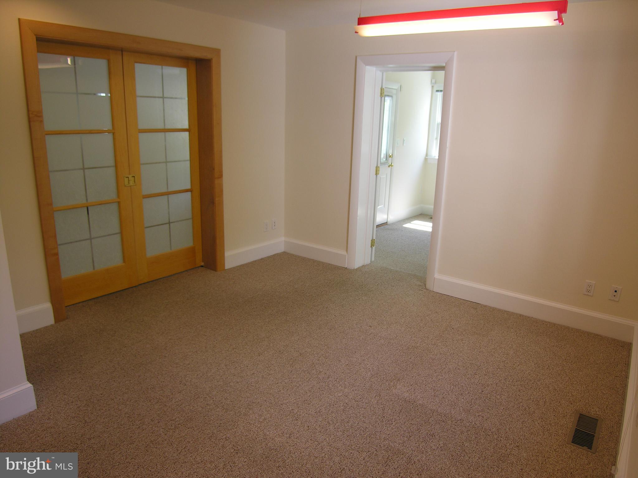120 Ashton Road Ashton, MD 20861 - Photo 11 of 33 Kitchen Table Space or Den with pocket doors to LR