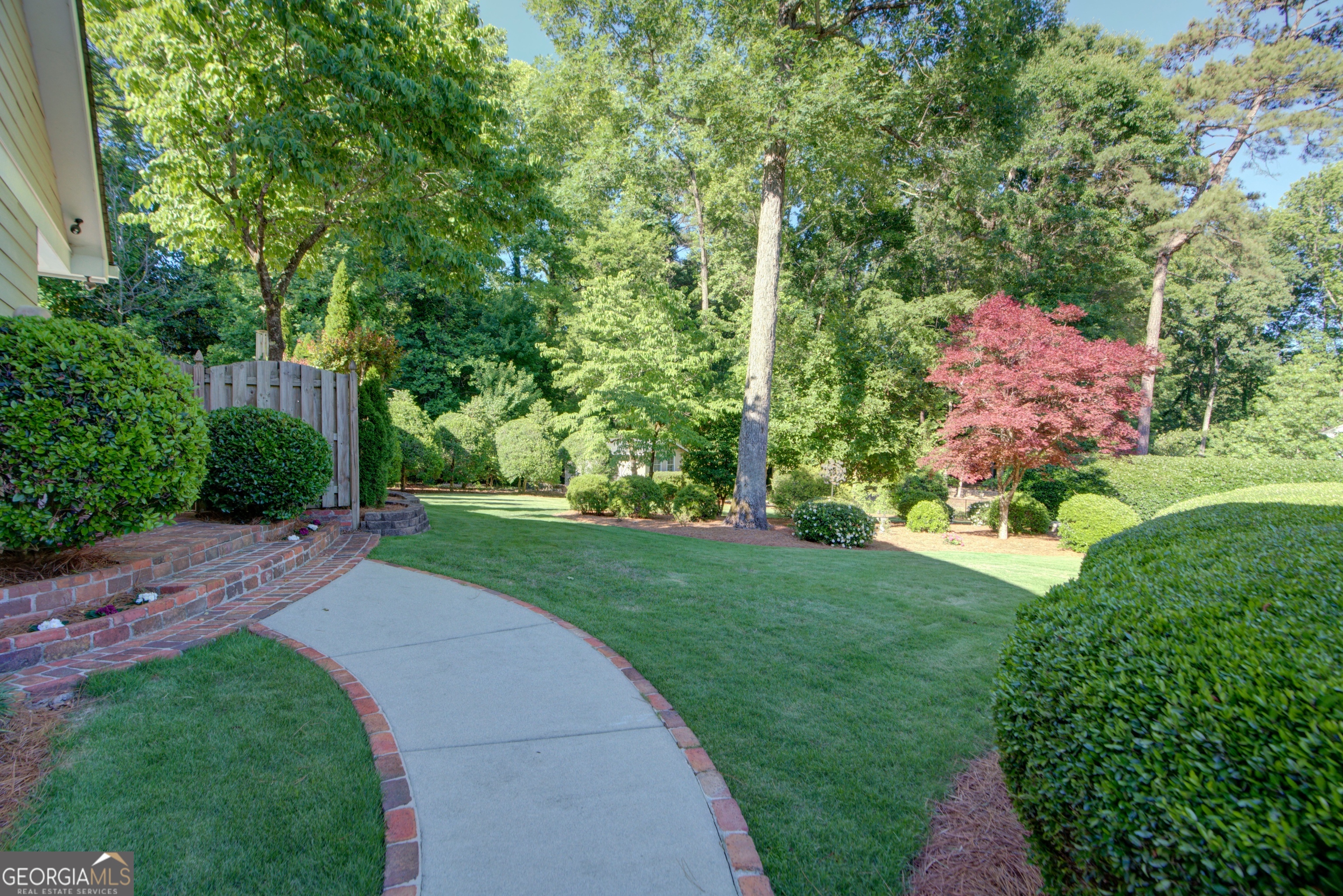 204 Green View Road Southwest Rome, GA 30165 - Photo 61 of 62 a view of a garden with plants and large trees