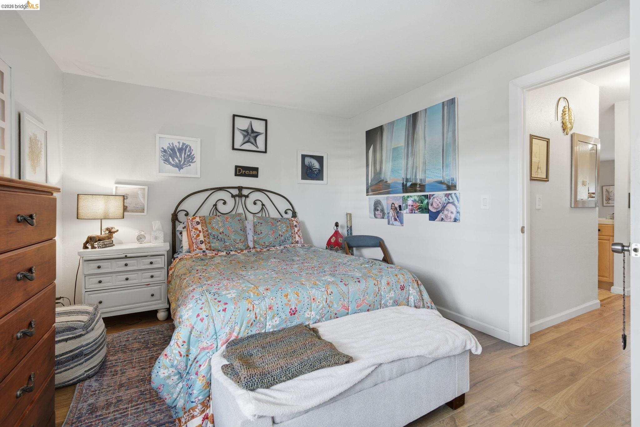 4081 Clayton Road, Unit 118 Concord, CA 94521 - Photo 14 of 30 Bedroom featuring wood finished floors and baseboards