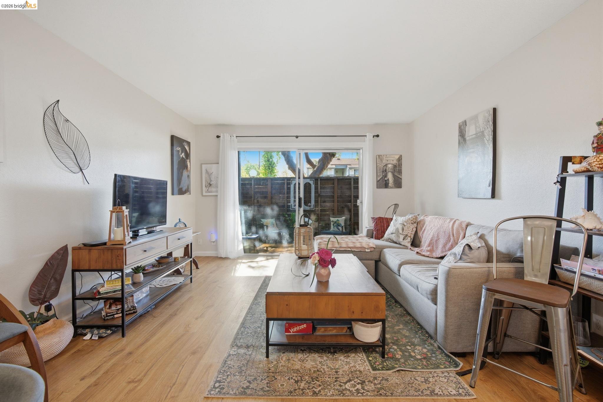 4081 Clayton Road, Unit 118 Concord, CA 94521 - Photo 2 of 30 Living area with light wood finished floors