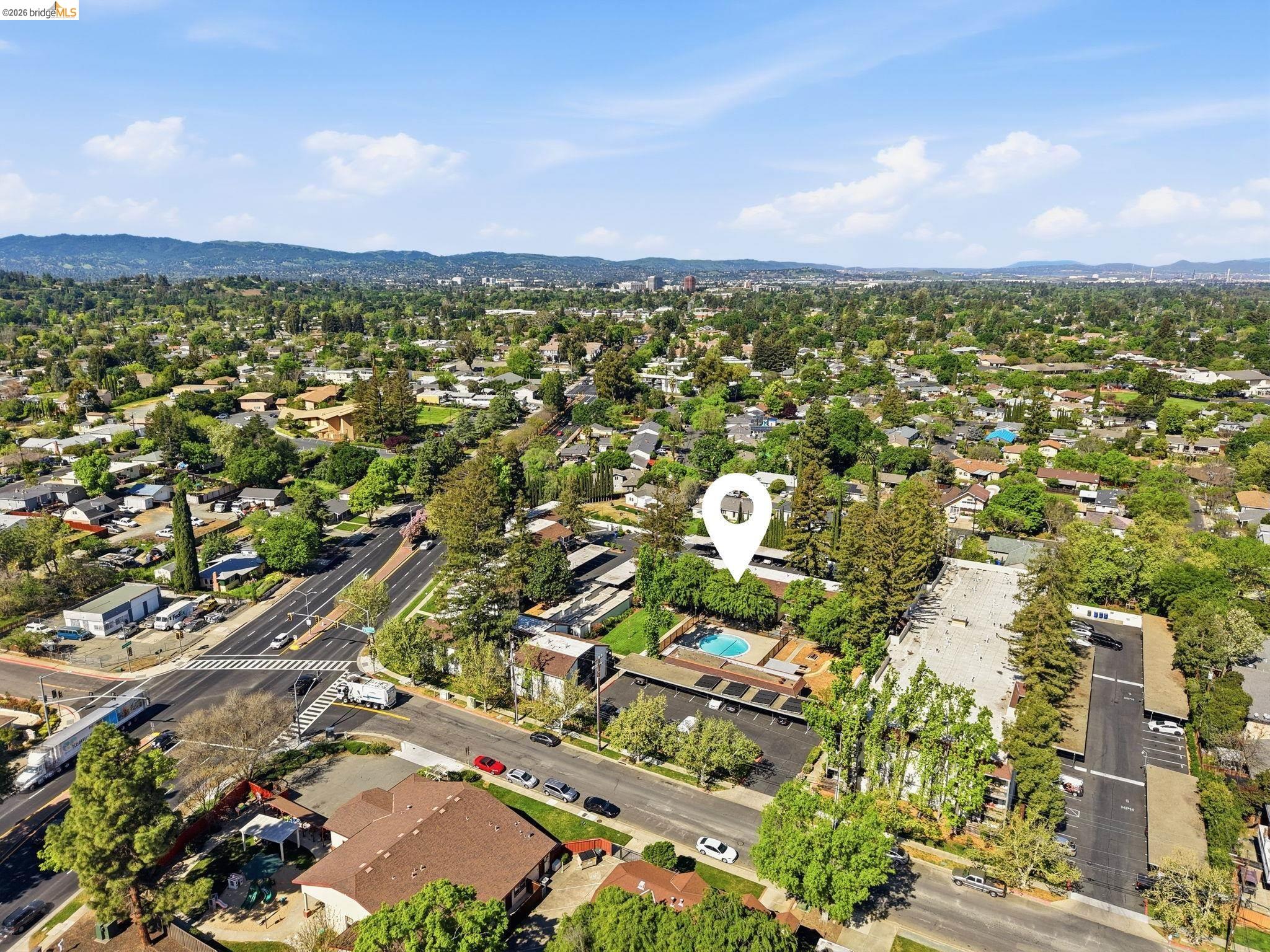 4081 Clayton Road, Unit 118 Concord, CA 94521 - Photo 27 of 30 Aerial view of residential area with a mountain backdrop