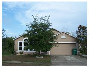1310 Blue Stream Road DeLand, FL 32720 - Photo 1 of 1 front view of house with a yard