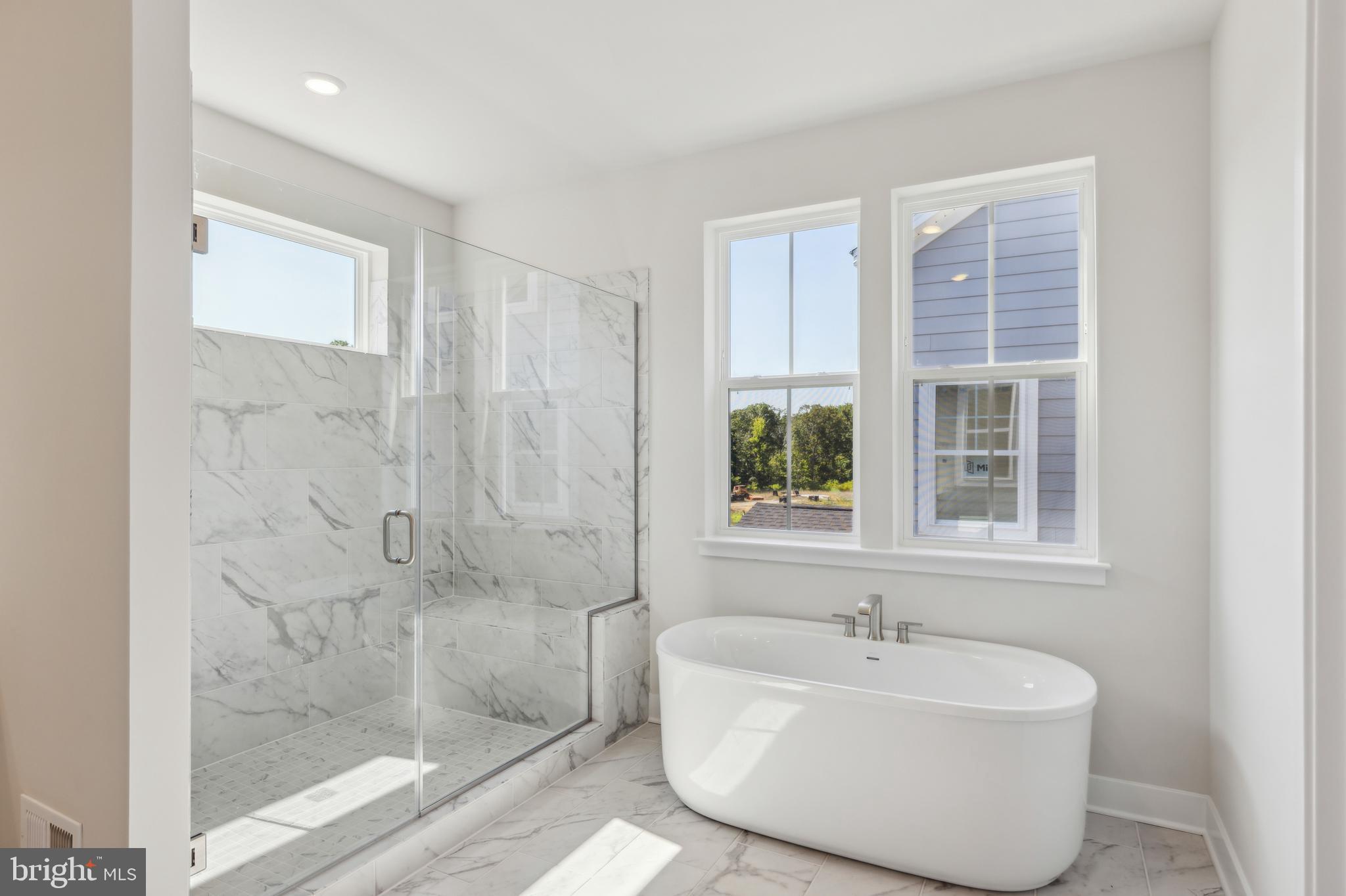 113 Stilly Way Annapolis, MD 21403 - Photo 6 of 13 a bathroom with a bathtub and shower
