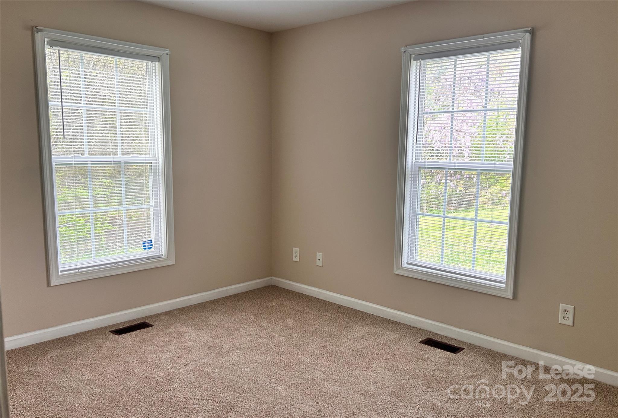 910 Aggie Street Kannapolis, NC 28083 - Photo 7 of 10 an empty room with a window