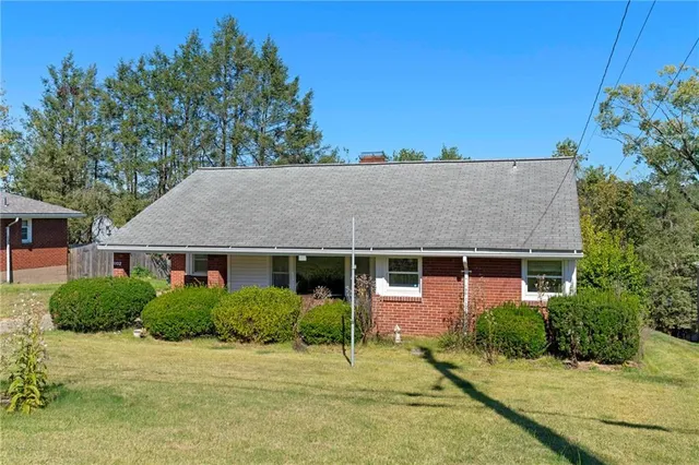 a house view with a garden space