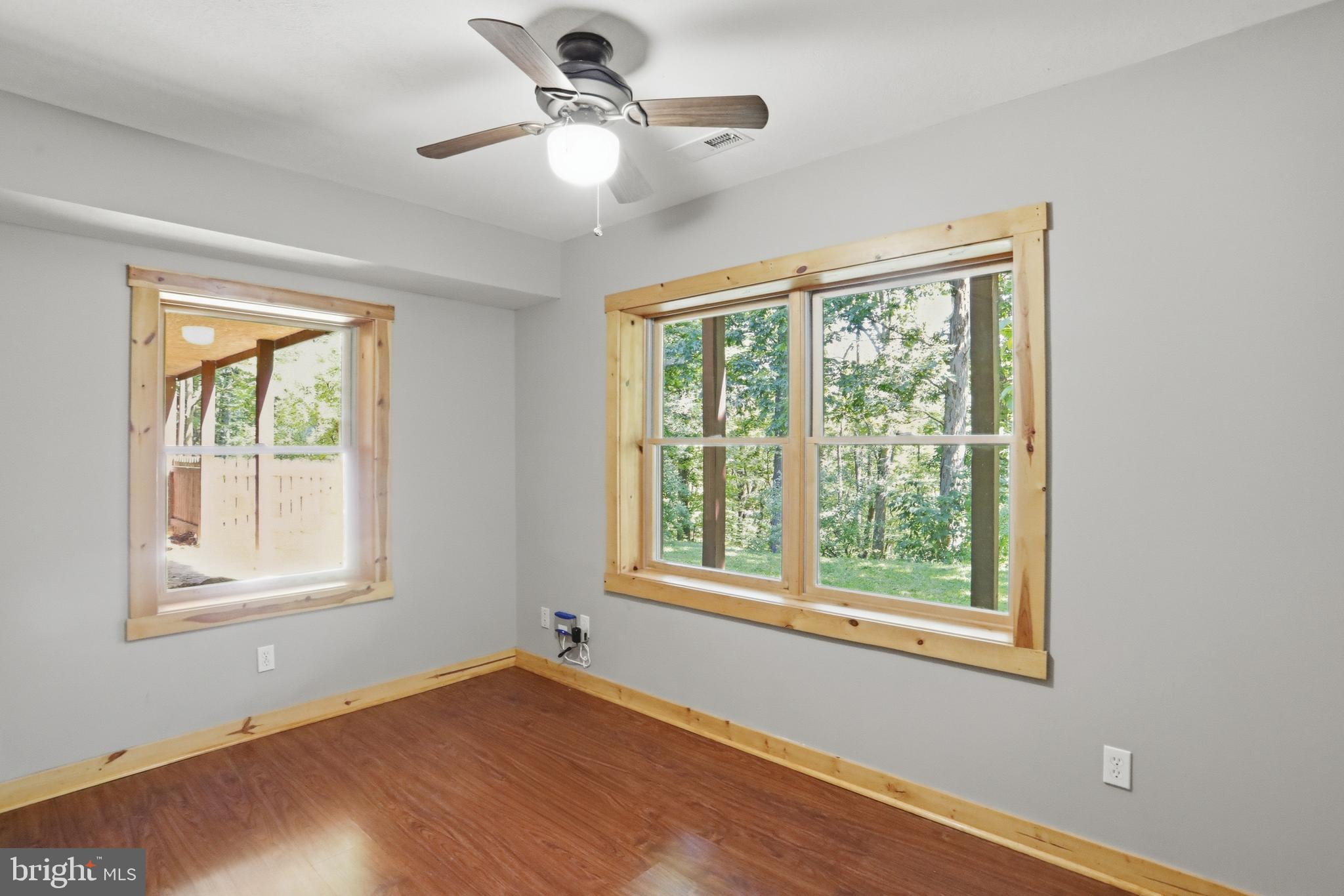1400 Core Road Romney, WV 26757 - Photo 36 of 73 a view of an empty room with a window and wooden floor