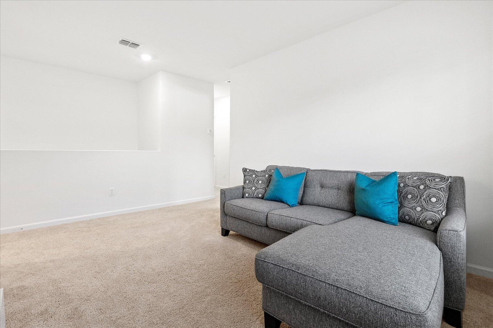 1671 Saxton Road Cocoa, FL 32926 - Photo 19 of 39 a living room with a couch