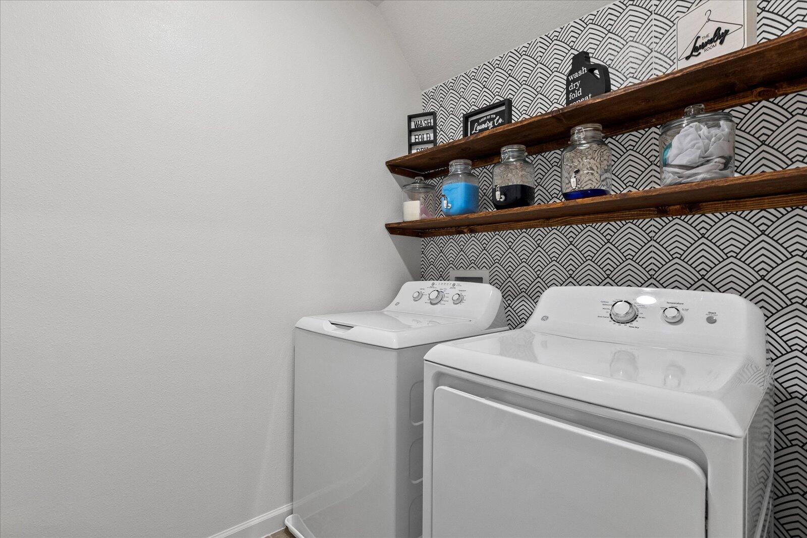 1671 Saxton Road Cocoa, FL 32926 - Photo 25 of 39 a utility room with dryer and washer