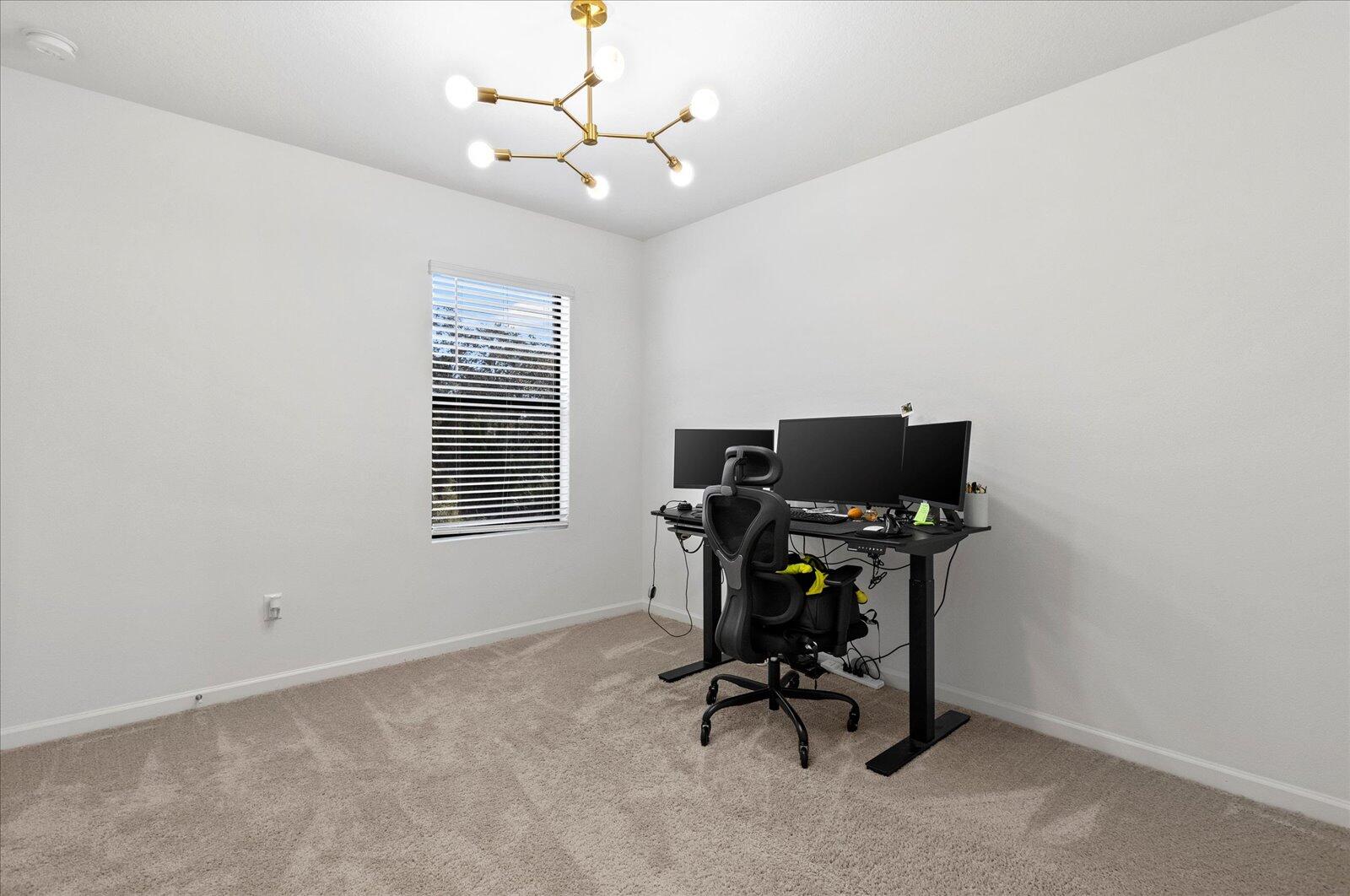 1671 Saxton Road Cocoa, FL 32926 - Photo 26 of 39 a view of workspace with windows