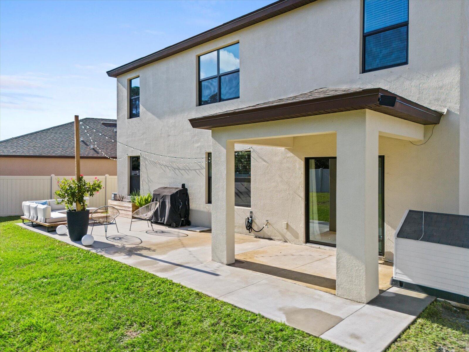 1671 Saxton Road Cocoa, FL 32926 - Photo 34 of 39 a view of a house with backyard and porch