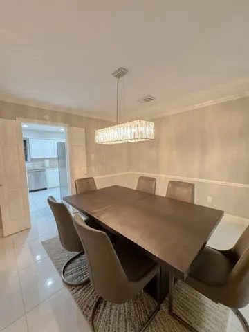 a view of a dining room with furniture