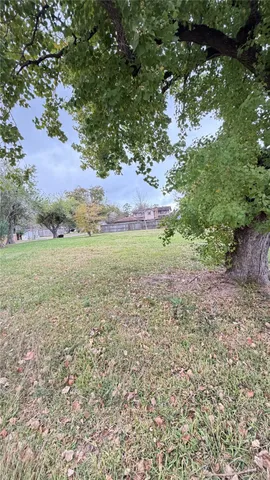 a view of outdoor space and yard