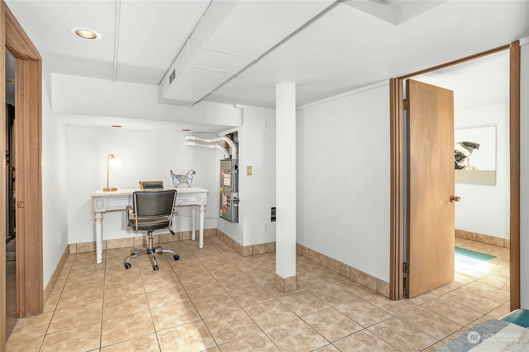 3603 Bagley Avenue North Seattle, WA 98103 - Photo 18 of 38 a view of a hallway with bathroom and a window
