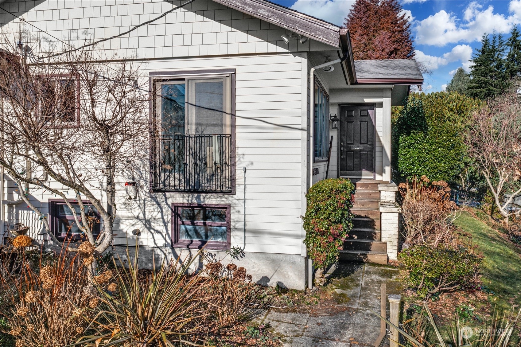 3603 Bagley Avenue North Seattle, WA 98103 - Photo 2 of 38 a small garden in the backyard of a house