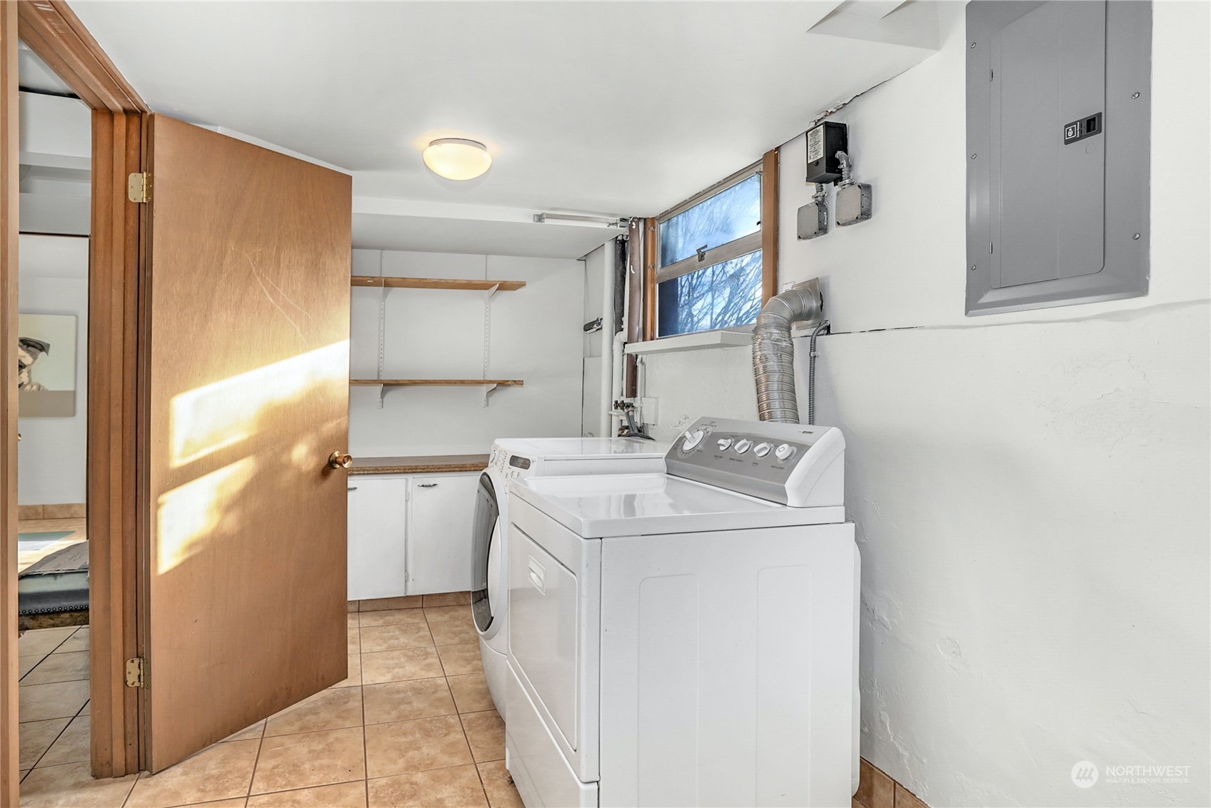 3603 Bagley Avenue North Seattle, WA 98103 - Photo 22 of 38 a utility room with dryer and washer